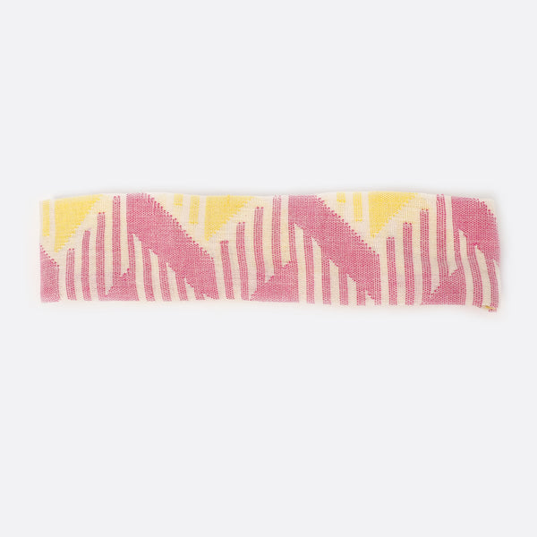 Front view of the Pink & Yellow headband. The background is white. 