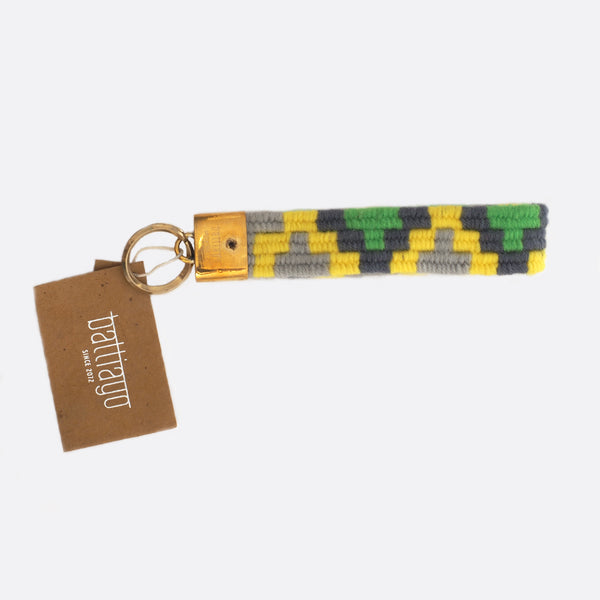 handwoven key chain with handmade brass buckle; key chain is grey, yellow and green