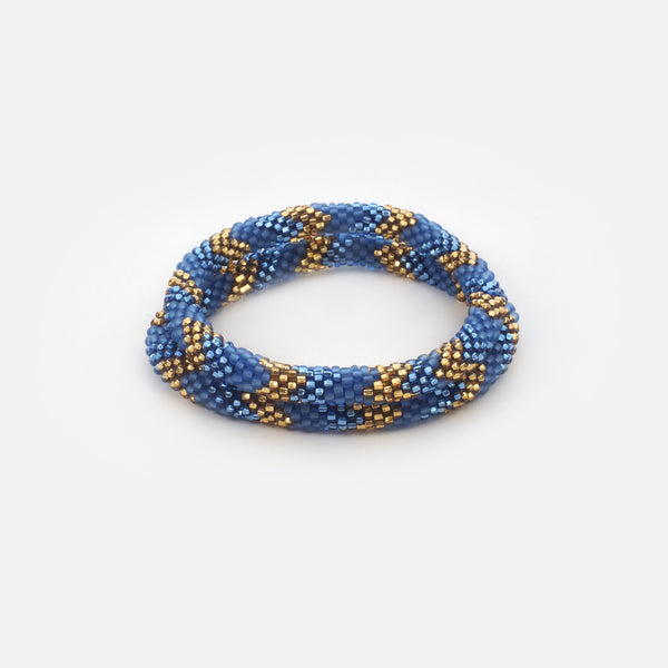Top view of a set of the two beaded bracelets. The background of the picture is white. The Battiayo bracelets are handmade from small glass beads by amazing women in Nepal.