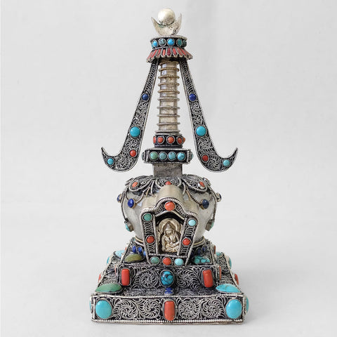 Front view, small stupa made of crystal and copper. Decorated with filigree. Silver plated. Set with coral, lapis lazuli and turquoise. Made by Shanta Shakya