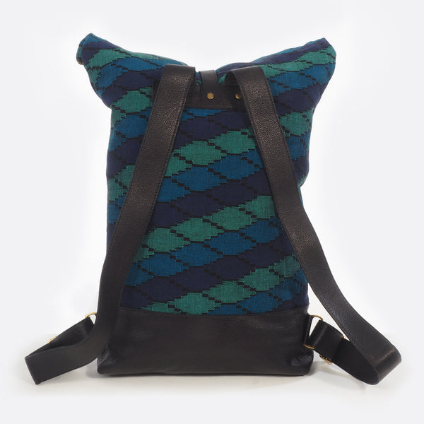 Back view of the Battiayo ,Deep Blue Sea’ backpack with handwoven dhaka fabric and leather. The shoulder straps are versatile and can be changed in length. 