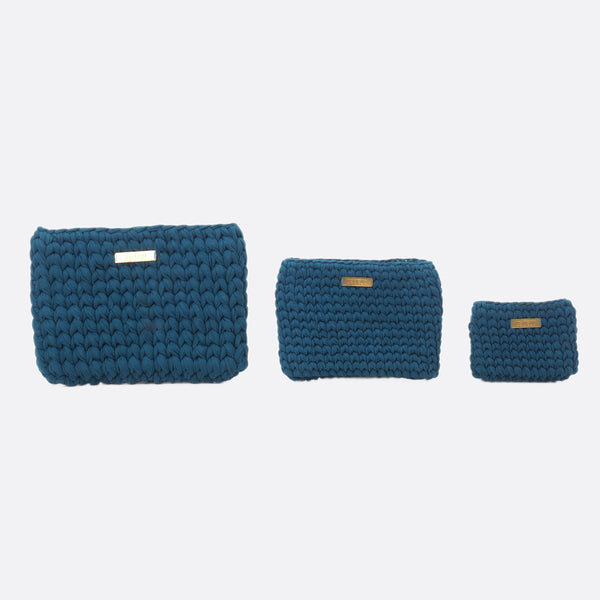 The three different sizes of the Battiayo clutch are shown. The big clutch is on the left, the medium clutch is in the middle and the small clutch is on the right. 