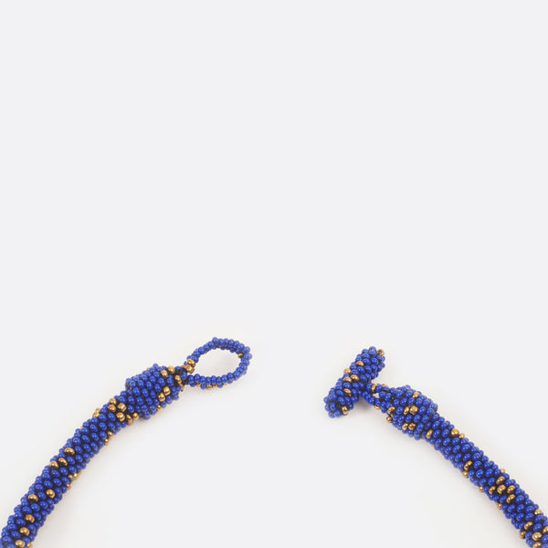 Close up of the handmade Battiayo necklace with open clasp. 