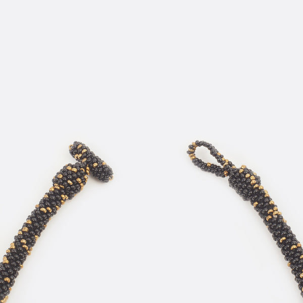 Close up of the handmade Battiayo necklace with a open clasp.