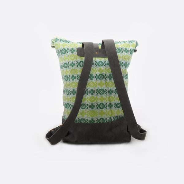 -Back view of Battiayo ,Cross Light Green’ backpack with handwoven dhaka fabric and leather. The shoulder straps are versatile and can be changed in length.