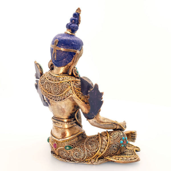 Green Tara, face and body carved from crystal, copper set with filigree, silver plated, gold plated set with turquoise and coral coloured stones. Back view